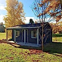 10 x 20 high classic with double doors and a 4 foot side porch.